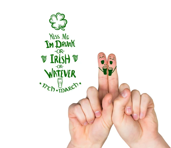 Composite image of patricks day fingers — Stock Photo, Image