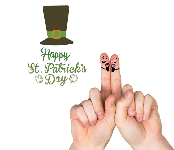 Composite image of patricks day fingers — Stock Photo, Image