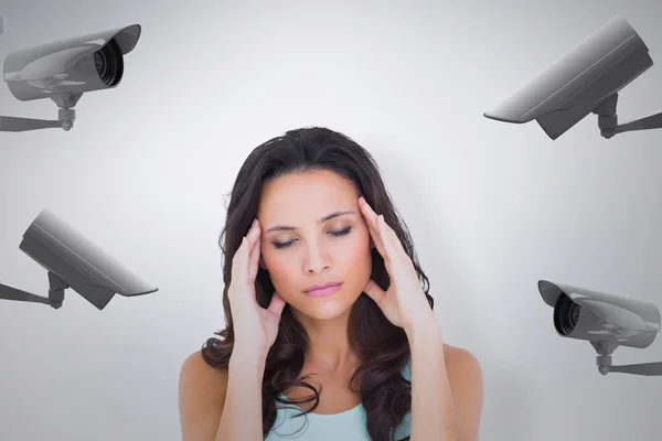 Pretty brunette with a headache — Stock Photo, Image