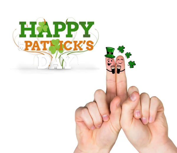 Composite image of patricks day fingers — Stock Photo, Image