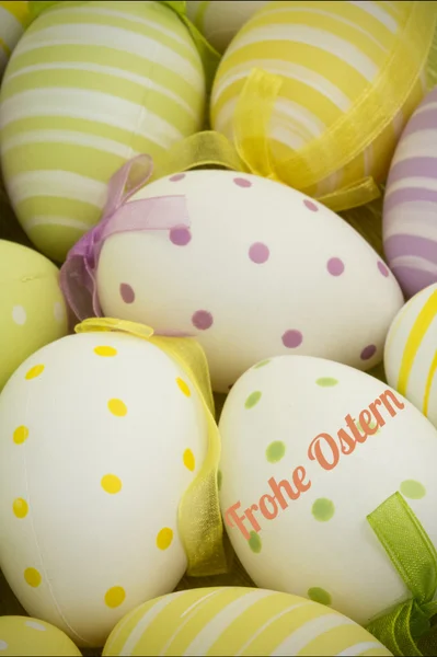 Composite image of frohe ostern — Stock Photo, Image