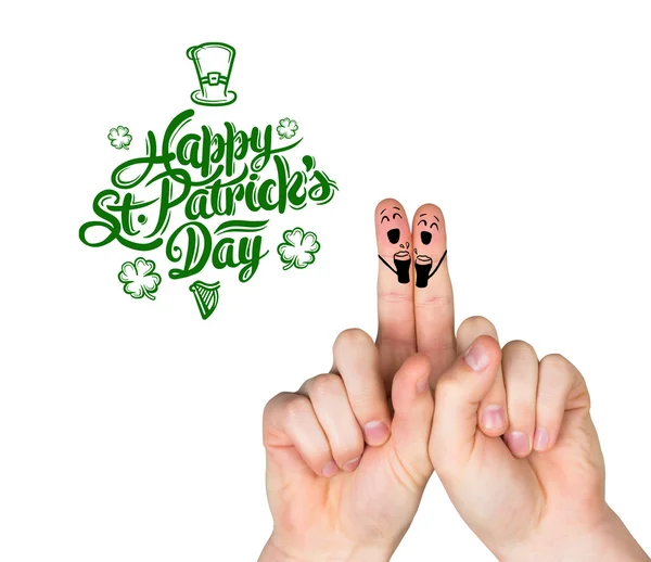 Composite image of patricks day fingers — Stock Photo, Image