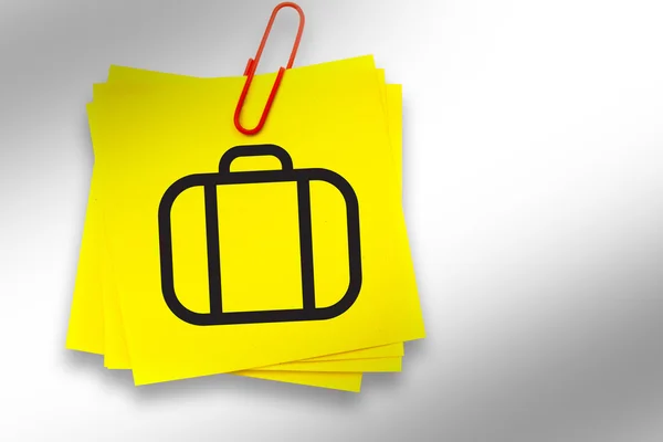 Briefcase graphic against sticky note — Stock Photo, Image