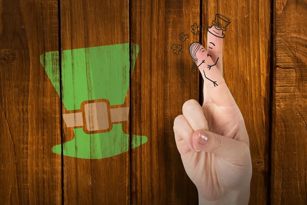 Composite image of patricks day fingers — Stock Photo, Image