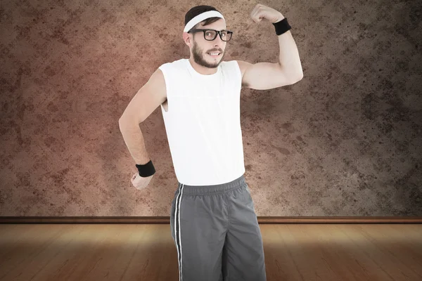 Geeky hipster posing in sportswear — Stock Photo, Image