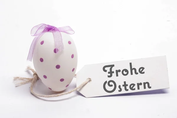 Composite image of frohe ostern — Stock Photo, Image