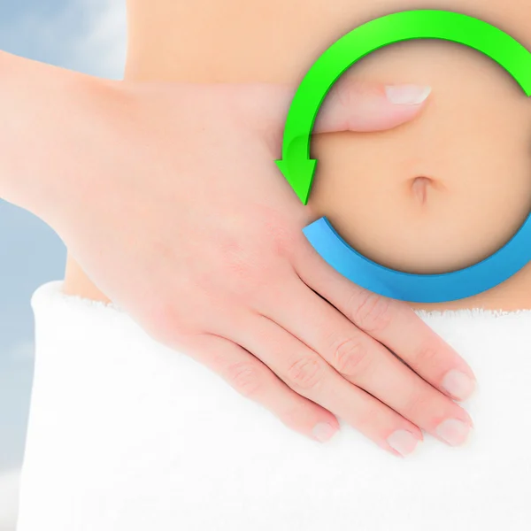 Mid section of a fit woman with hand on stomach — Stock Photo, Image