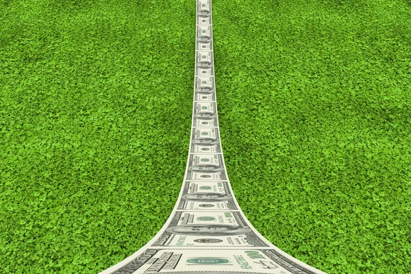 Dollar road against grass — Stock Photo, Image
