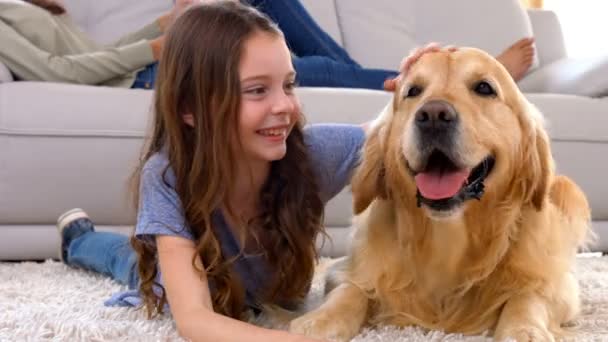 Menina feliz com seu cão — Vídeo de Stock