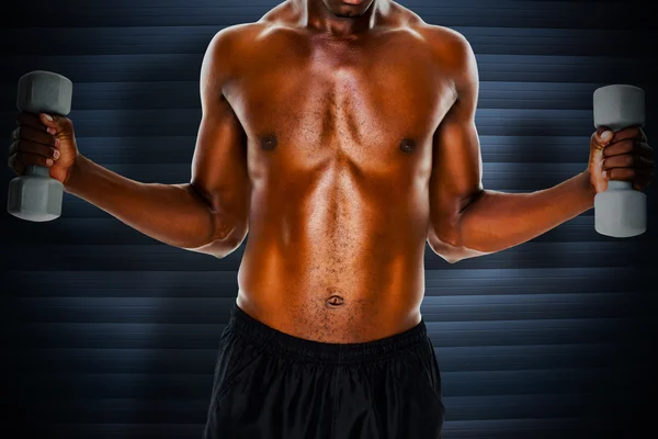 Samengestelde afbeelding van mid sectie van fit shirtless man tillen stom — Stockfoto
