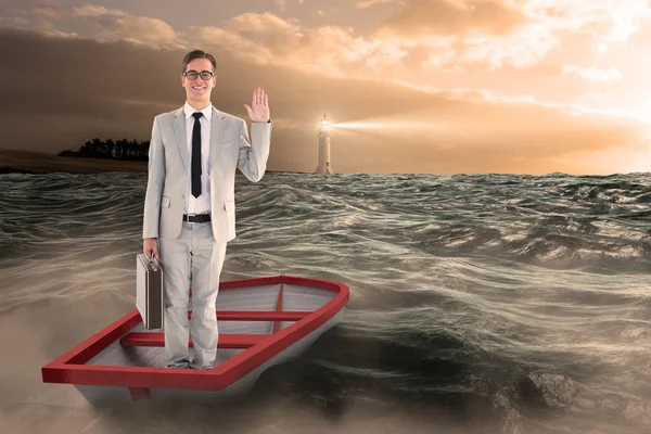 Businessman waving in boat — Stock Photo, Image