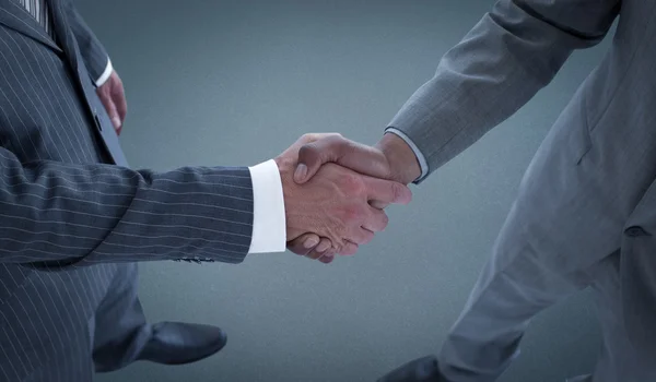 Composite image of handshake — Stock Photo, Image