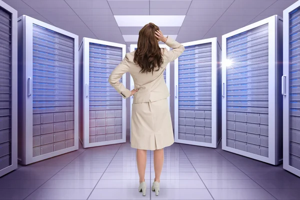 Businesswoman against server room — Stock Photo, Image