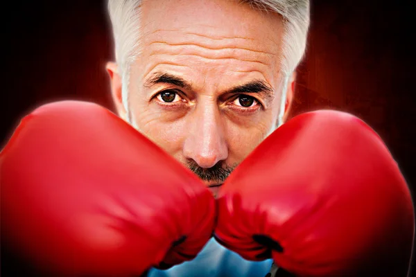 Close-up portrait of a determined senior boxer — Stock Photo, Image