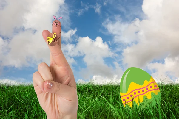 Fingers as easter bunny against clouds — Stock Photo, Image