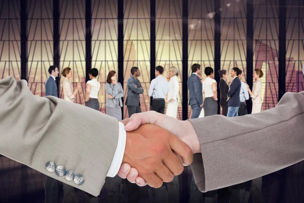 Composite image of side view of shaking hands — Stock Photo, Image