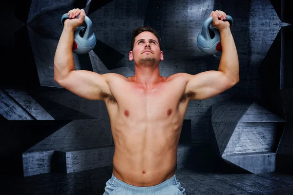 Kompositbild eines Bodybuilders mit Kettlebells — Stockfoto
