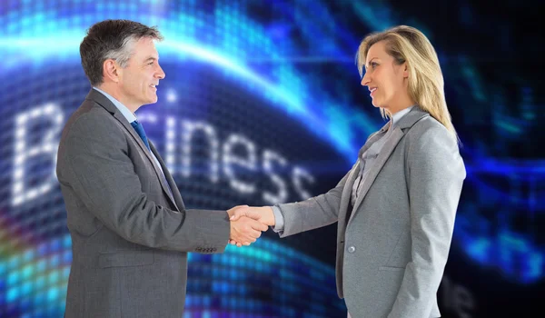 Pleased businessman shaking the hand — Stock Photo, Image
