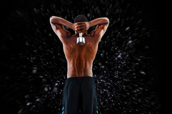Immagine composita della vista posteriore di un uomo senza maglietta in forma che solleva muto — Foto Stock