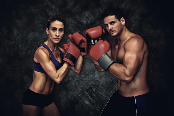 Imagem composta de casal de boxe — Fotografia de Stock