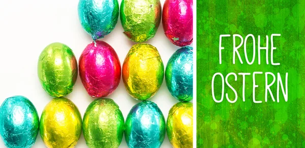 Composite image of frohe ostern — Stock Photo, Image