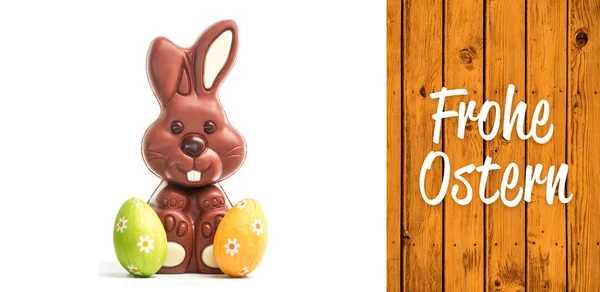 Frohe ostern against wooden planks — Stock Photo, Image