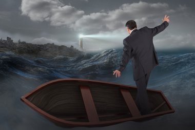 Businessman balancing in boat against stormy sea clipart