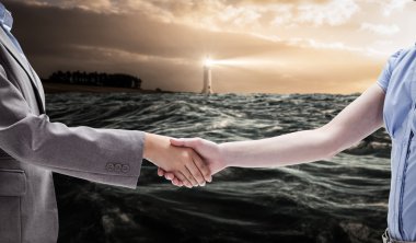 Composite image of handshake between two women clipart