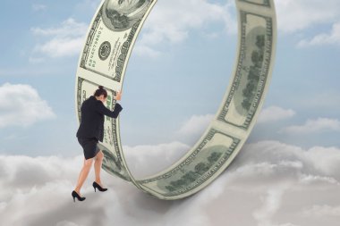 Businesswoman with banknotes against cloudy sky clipart