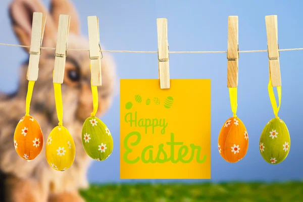 Happy Easter greeting against bunny rabbit — Stock Photo, Image