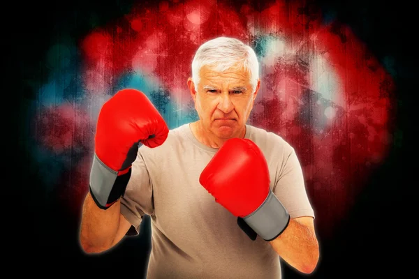 Portrait of a determined senior boxer — Stock Photo, Image