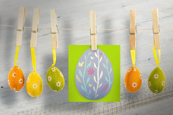 Easter eggs against wooden planks — Stock Photo, Image