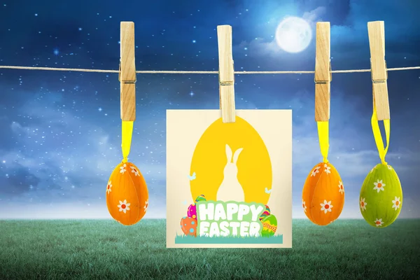 Happy easter graphic against field at night — Stock Photo, Image