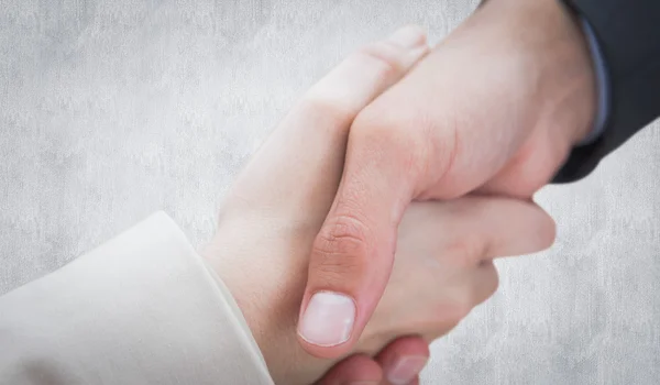 Close up on new partners shaking hands — Stock Photo, Image