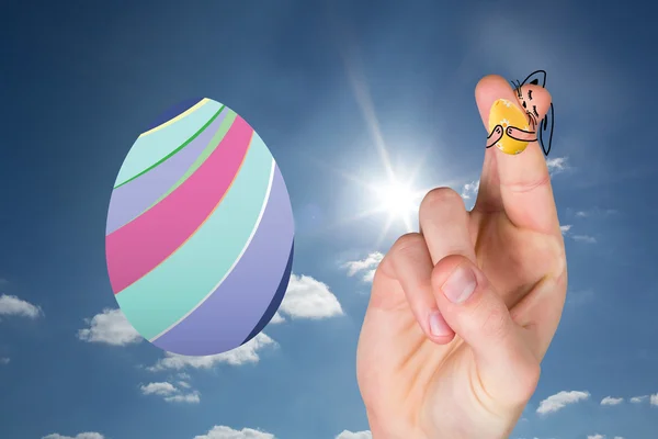 Fingers as easter bunny against cloudy sky — Stock Photo, Image