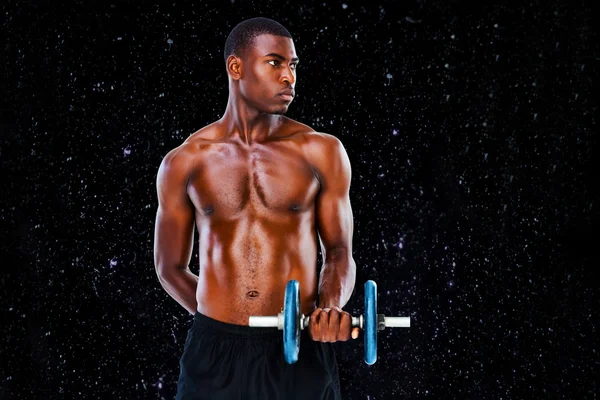 Composite image of serious fit shirtless young man lifting dumbb — Stock Photo, Image
