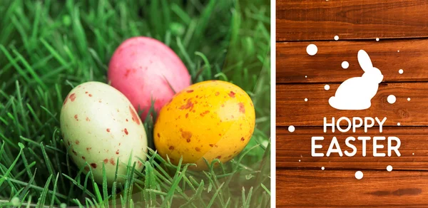 Feliz gráfico de Pascua contra tablones de madera —  Fotos de Stock