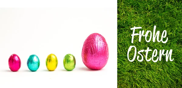 Composite image of frohe ostern — Stock Photo, Image