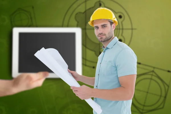 Architect holding blueprint — Stock Photo, Image