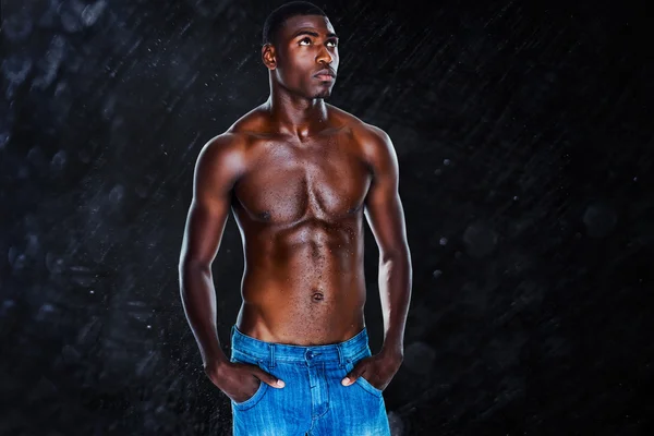 Samengestelde afbeelding van fit shirtless jonge man — Stockfoto