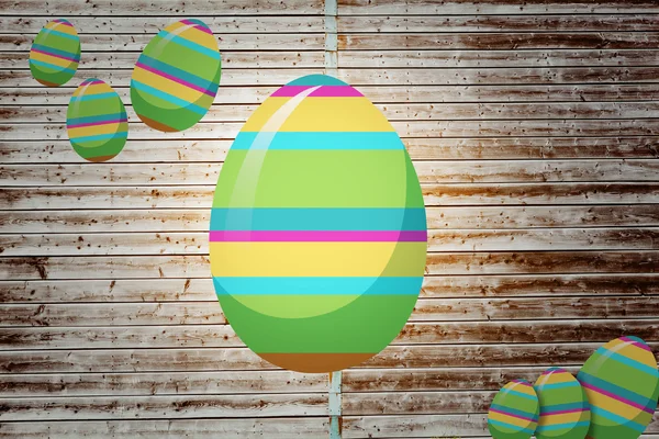 Easter egg against wooden planks — Stock Photo, Image