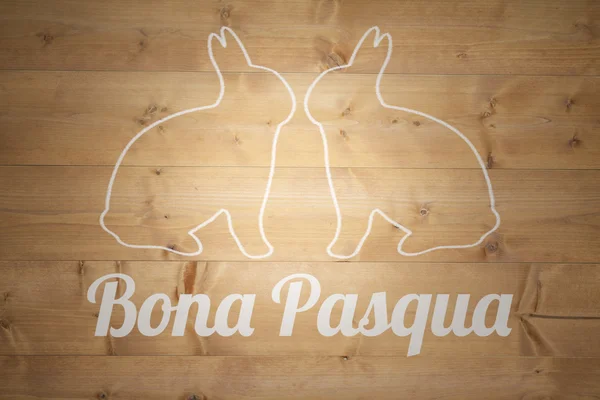 Bona pascua against bleached wooden planks — Stock Photo, Image