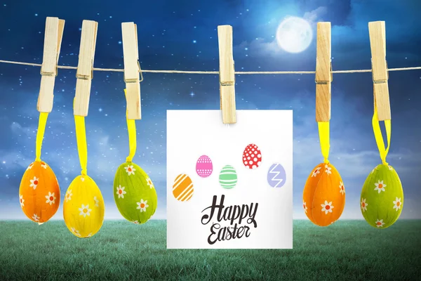 Happy easter afbeelding tegen groen veld — Stockfoto