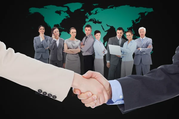 Smiling business people shaking hands — Stock Photo, Image