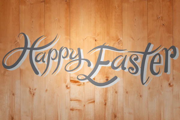 Happy easter against wooden planks — Stock Photo, Image