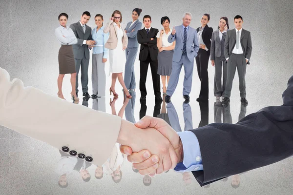 Smiling business people shaking hands — Stock Photo, Image