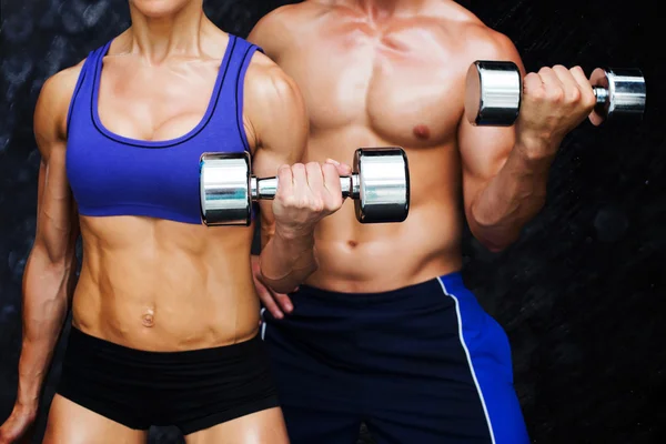 Imagem composta de casal musculação — Fotografia de Stock