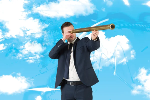 Businessman looking through telescope — Stock Photo, Image