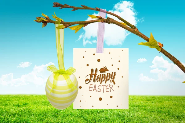 Happy easter afbeelding tegen veld — Stockfoto