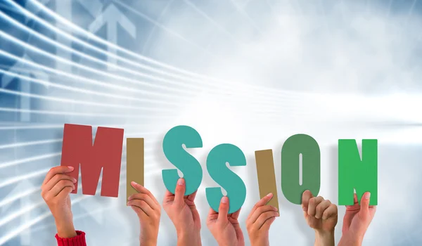 Hands showing mission against arrow graphics — Stock Photo, Image